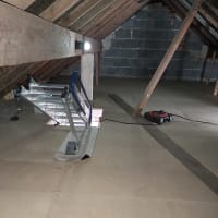 After - loft boarded with enlarged hatch, easy ladder and loft lights