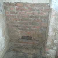 Bricks removed for cavity clear.