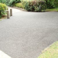 Bonded 6mm grey granite for heavy commercial use, also showing a granite set edging, available in different colours.