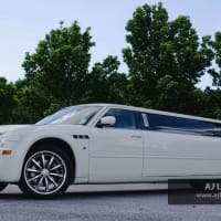 Chrysler 300c limousine , white colour , two tone leather ,8 seats , krystal bar , 22