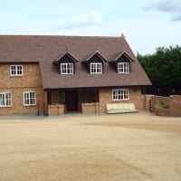 A double layer of hot bitumen and 6mm golden gravel was used for this courtyard.