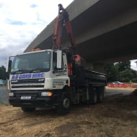 Muck Away on a Roundabout under a Bridge
