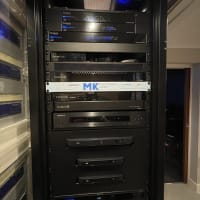 rack for home automation, containing networking equipment, audio equipment, home automation processor